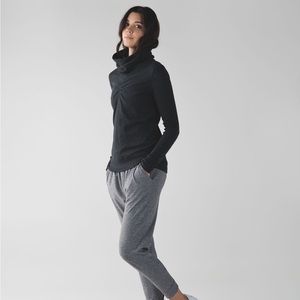 Lululemon In a cinch black pullover w/ ponytail hole.  Size 4, great condition